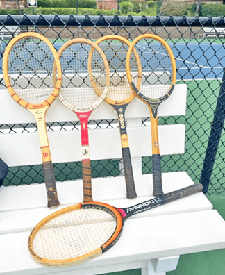 Wooden racquets used in the third round of the mixer.