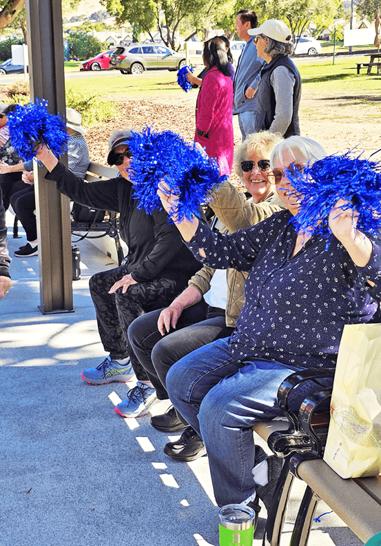 The cheerleading section cheering for all players.