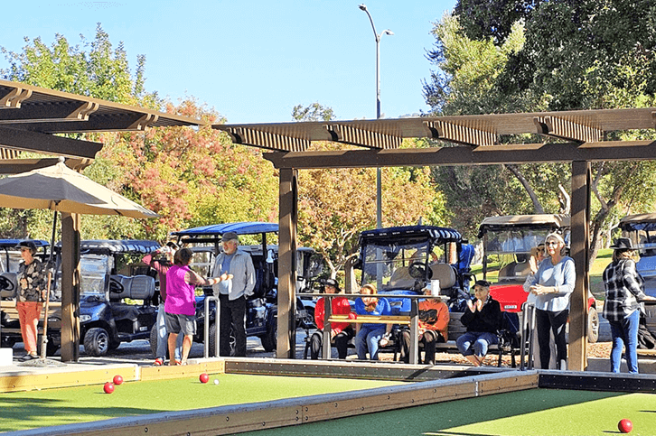 The long 9 women and Shonis enjoying a day on the courts.