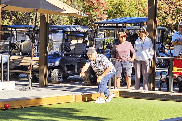 The 18 hole and long 9 women groups engaging in fun bocce.