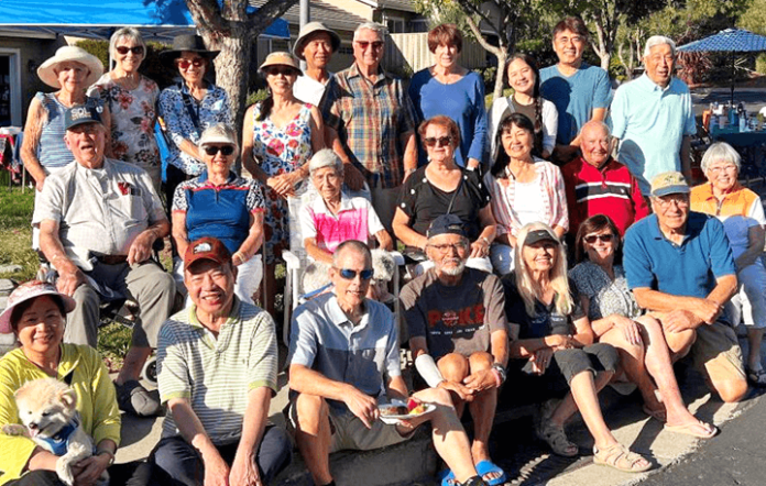 Front Row (left to right): Fen Tran and Lucky, Tony Tran, John Perry, Leighton Horio, Linda Koski, Eilish Perry, Jim Koski, Sumi Minami. Middle Row: Dennis Davenport, Phyllis Mueller, Asako Nakamura and Becky, Olga Silva, Mary Horio, John Mueller. Back Row: Ann Davenport, Michele Bosakowski, Suzy Kim, Jinhee Kang, Steve Kang, Mario Silva, Margaret Arneson, Lesley Chen, John Wang, Don Minami. Photo by Jim Koski