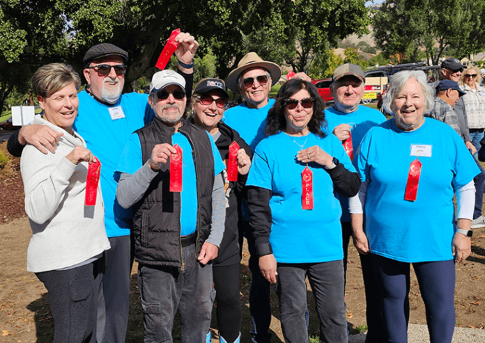 Second place finishers, Game of Throws. Front row: Tricia Hunt, Captain Todd Horvatich, Espie Martinez, Marie Burn. Back row: Tom Hunt, Tina Parsley, Daniel Martinez and Shel Schumaker.