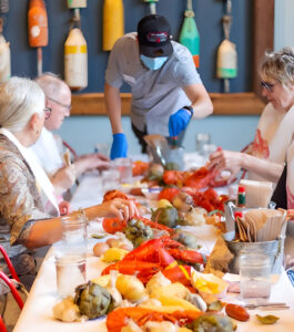 Picture of people enjoying lobster