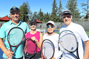 New tennis players (left to right): Jayme and Lynn Dickson, and Lolivic and Randy Shaw.