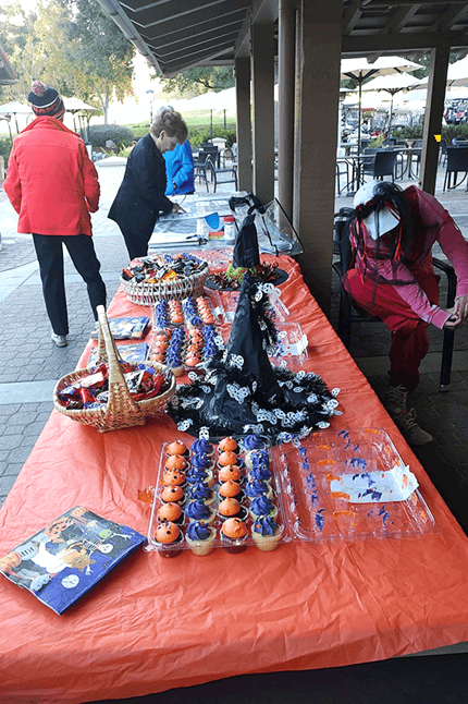 The 9 Hole Women’s Halloween goodies table.