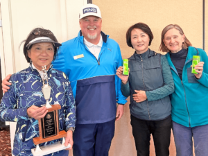 January Captain’s trophy winner Emily Li, Director of Golf Scott Steele, and January low putts winners In Kim and Cindy Fuller.