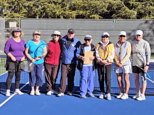 Left to right: Sharon Bartels, Mitzi Macon, Julie Hawkinson, Brett Foreman, coach, Betty Olsen, captain, Liz Kung, co-captain, Gail Tuft, Helen Varenkamp.