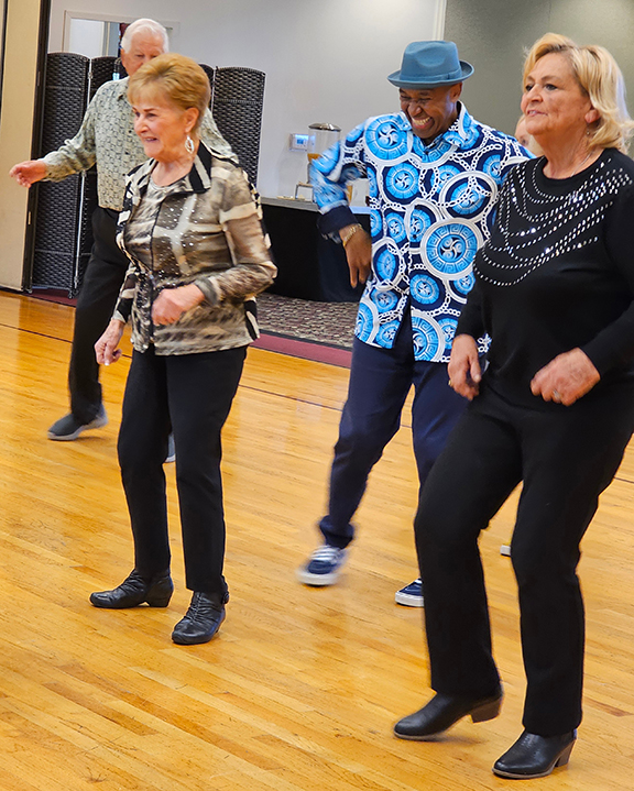 David Johnson dancing with Bocce players