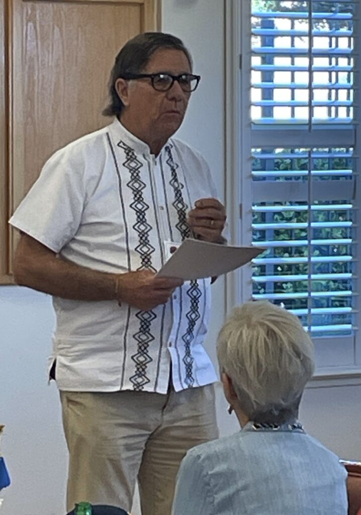 Marine Veteran Craige Edgerton speaking to audience.