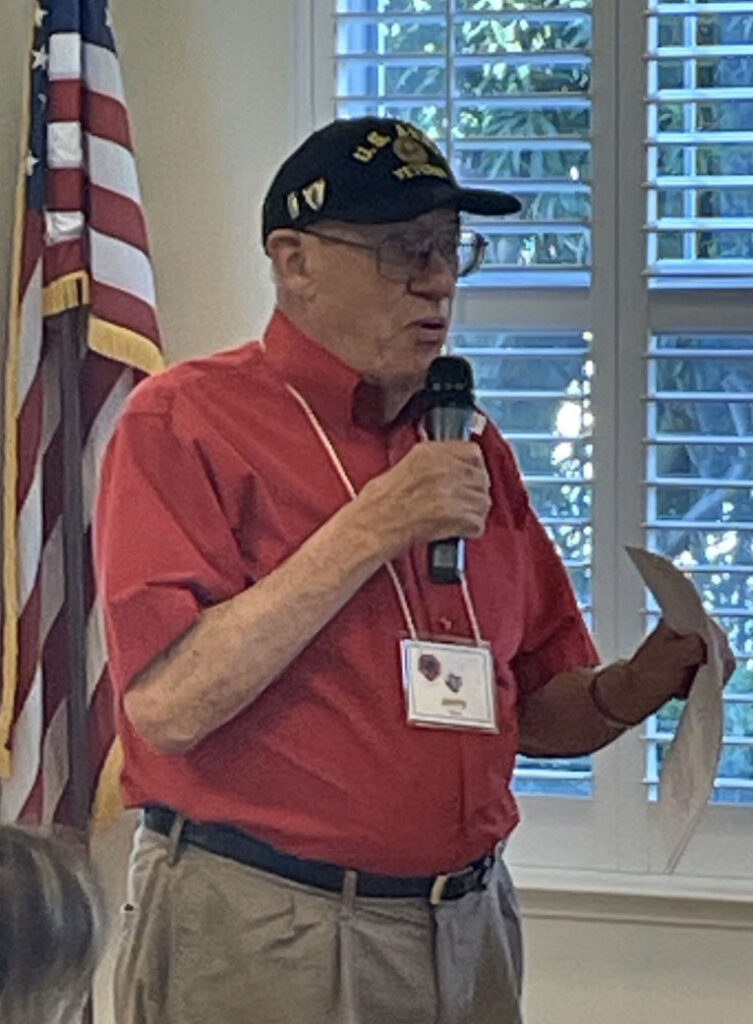 Army Veteran Jerry Neece speaking to audience.